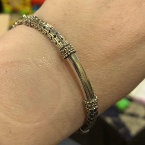 Sterling silver filigree hinged bracelet. Made in Indonesia. Fits 7.5 wrist.